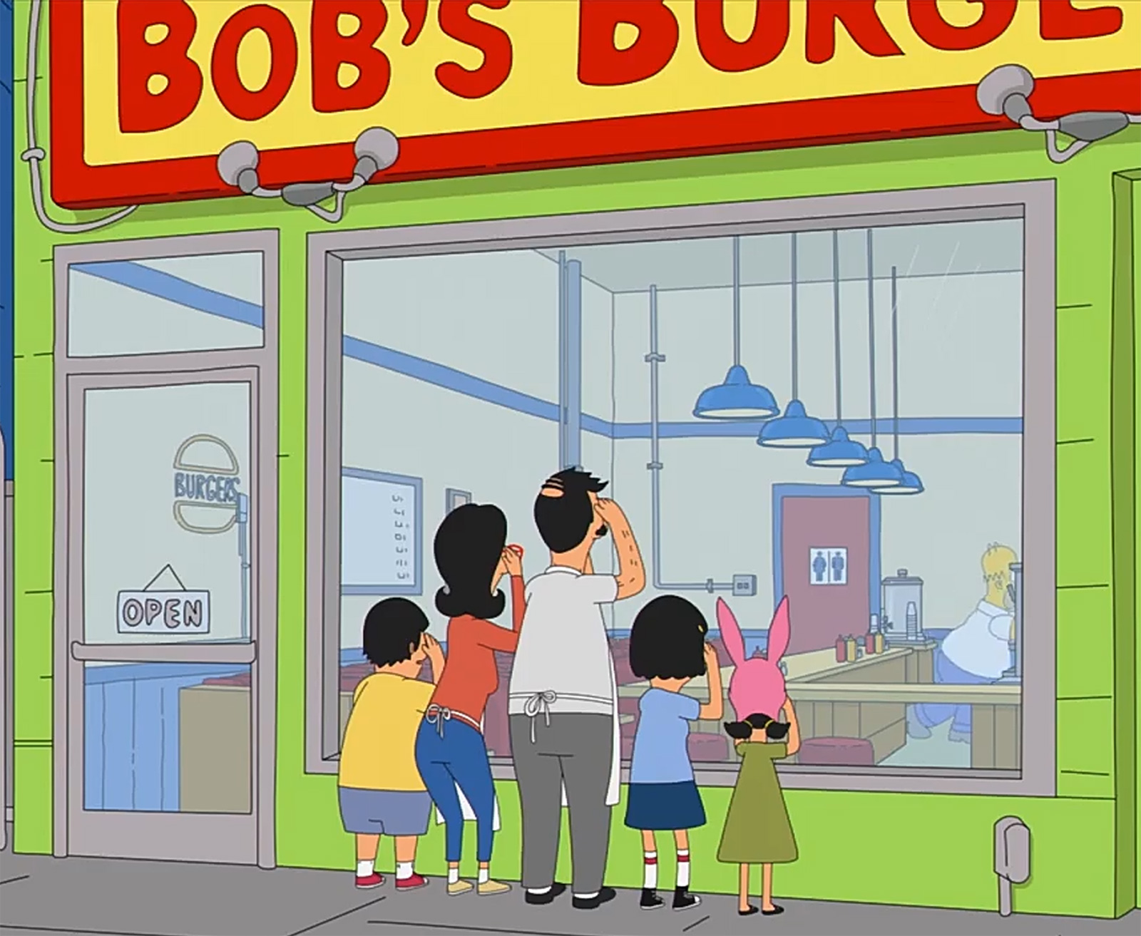 family looking at homer